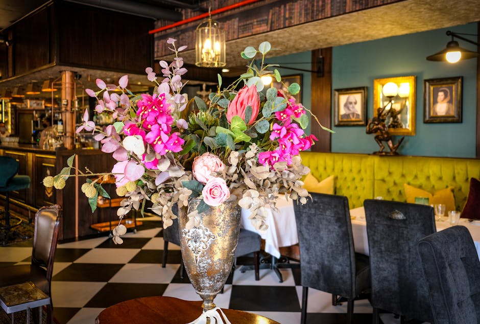 A stunning floral arrangement decorates a vintage-style restaurant interior, adding a touch of elegance