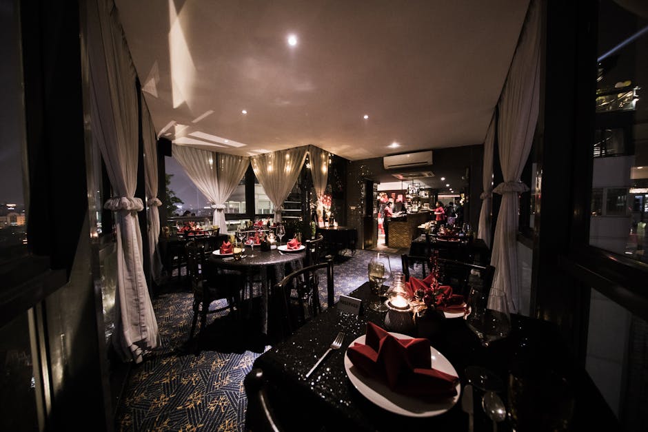 A beautifully set dining room with elegant decor and a cozy ambiance, perfect for fine dining experiences